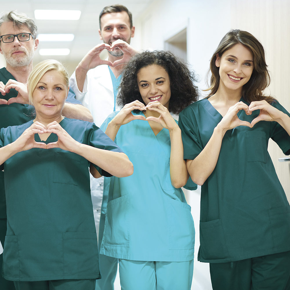 Group of doctors with heart symbol